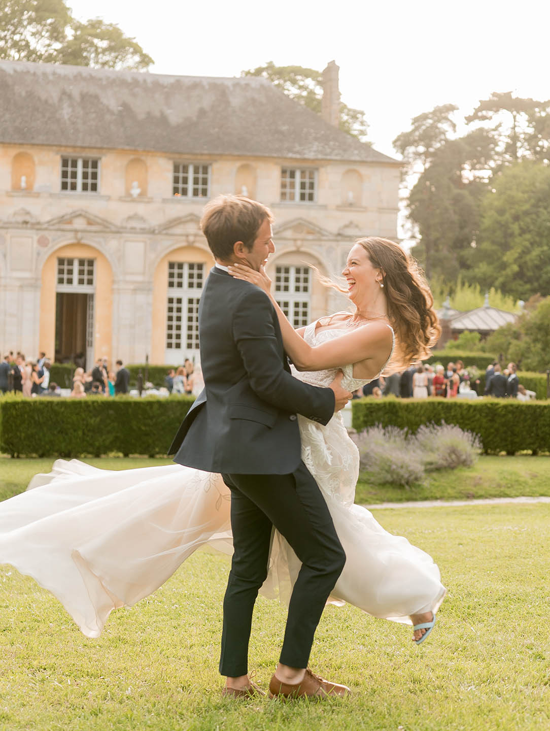 chateau de vallery bride and groom spinning on lawn