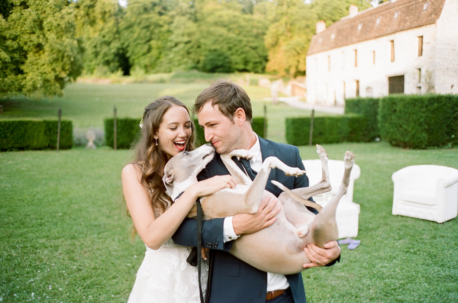 bride and groom with whippet