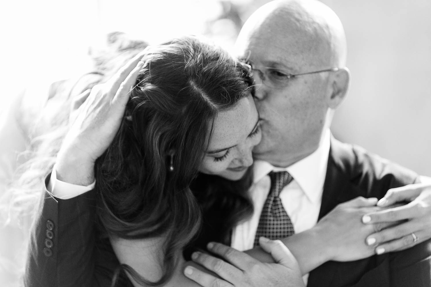 chateau de vallery wedding bride and father embrace