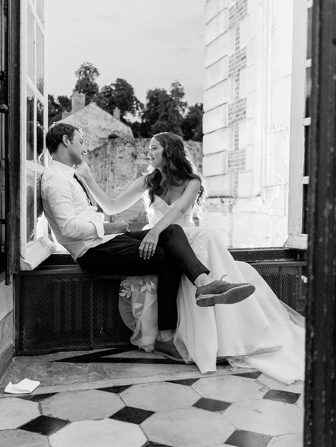 bride and groom share a quiet moment at chateau de vallery wedding