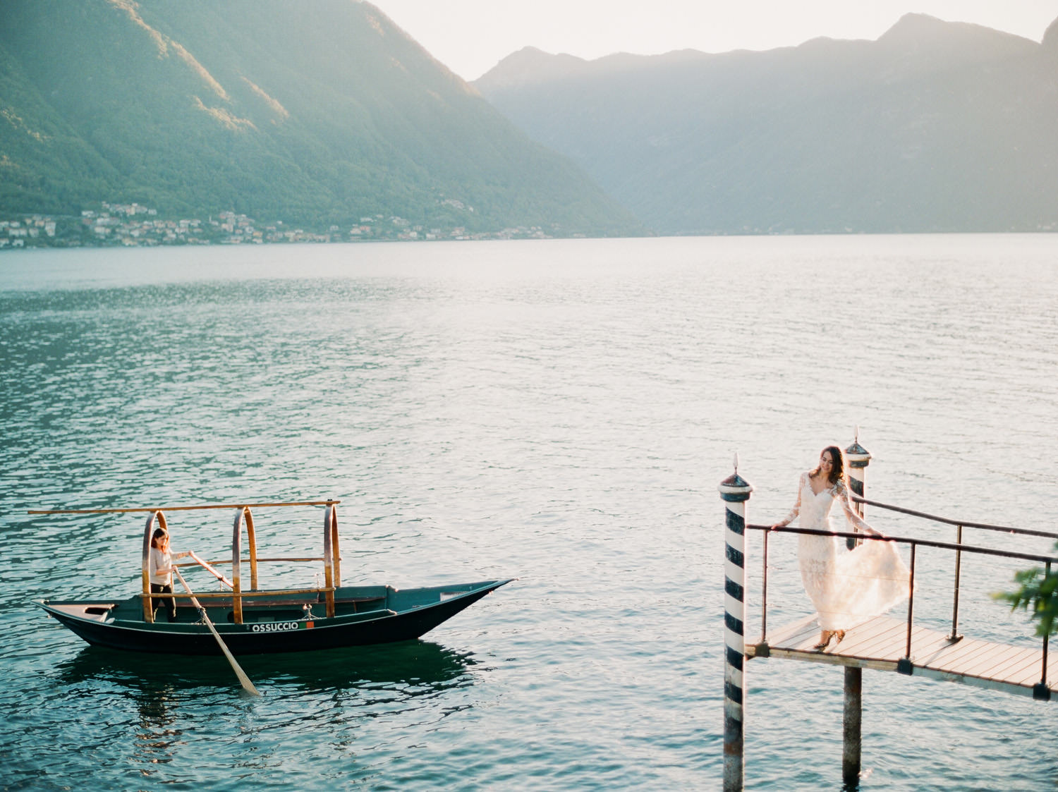 villa balbiano view of lake como with bride on dock and boat